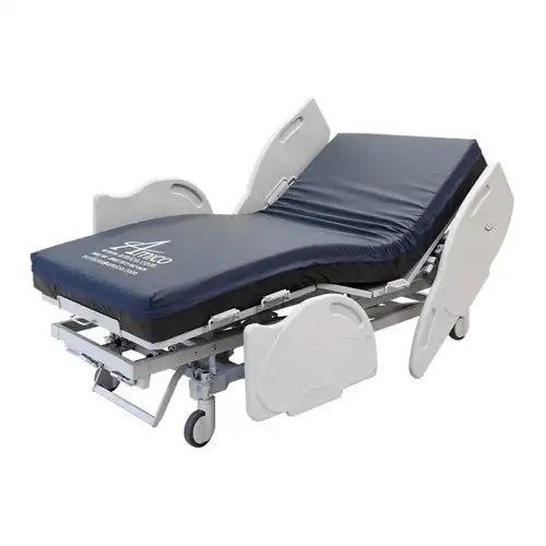 Hospital bed with blue mattress on a white background