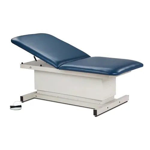 Blue examination table on a white background