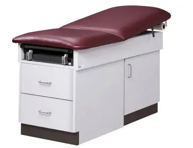 Medical examination table with maroon top on a white background