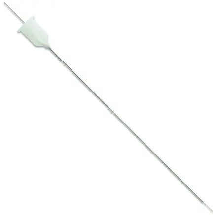 Long thin metallic needle with a small white object at one end on a white background