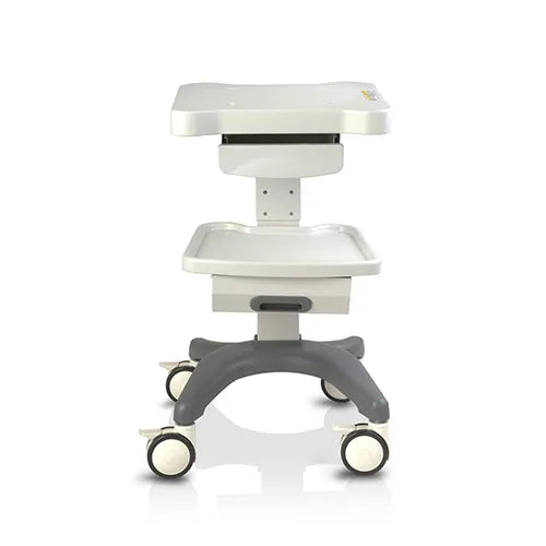White medical examination table with wheels on a white background