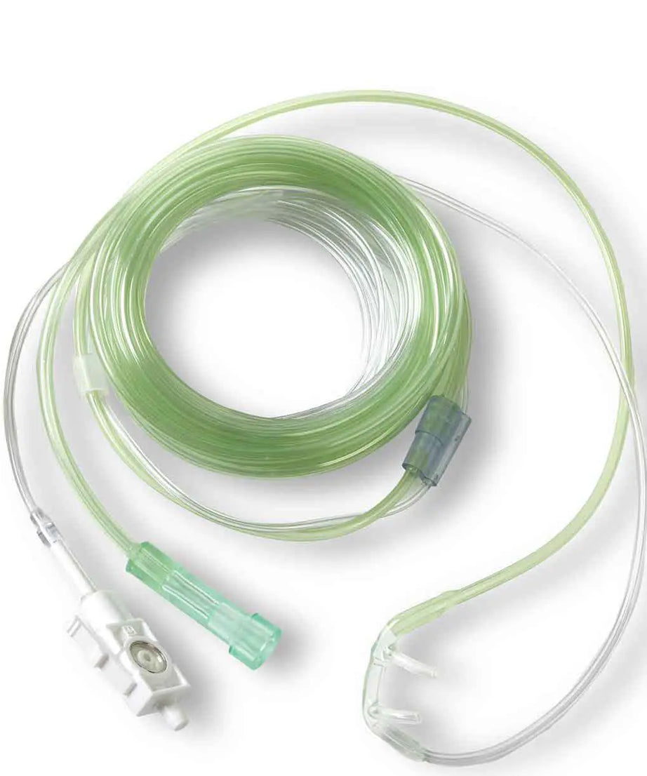 Medical oxygen tube with clear and green components on a white background