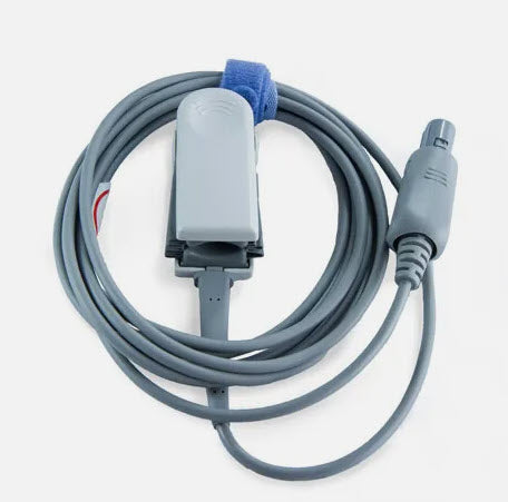 Coiled medical sensor cable on a white background