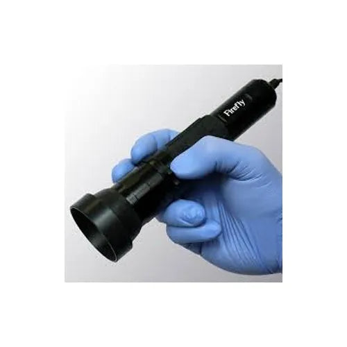 Black handheld device with 'FeverFly' branding held by a gloved hand on a white background