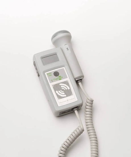 Medical device with a coiled cable on a white background