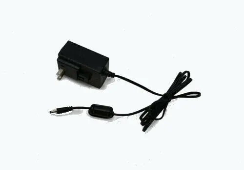 Black electronic adapter with power cord on a white background
