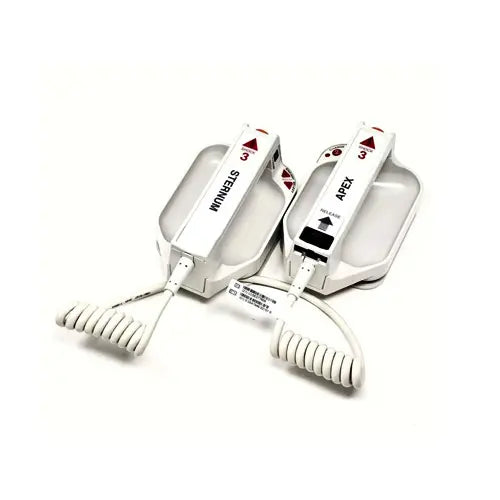 Two white ZOLL electronic paddles labeled 'Sternum' and 'Apex' on a white background.