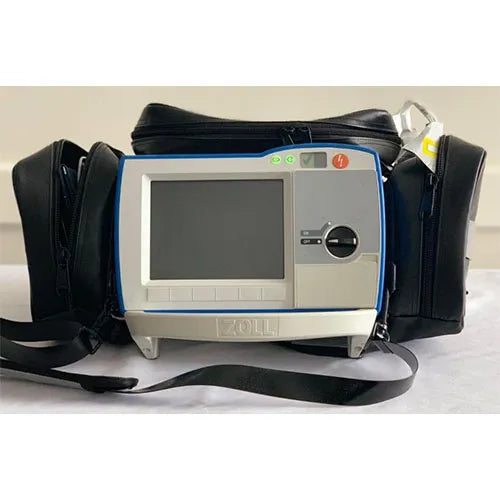 Medical device with a screen and control panel, surrounded by black straps on a white background