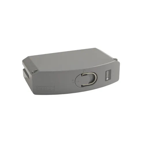 Gray electronic device with a circular component on a white background