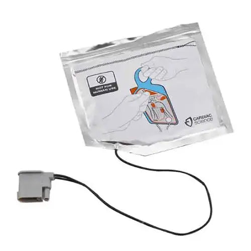 AED (Automated External Defibrillator) electrode pads with a cable and a grey connector on a white background