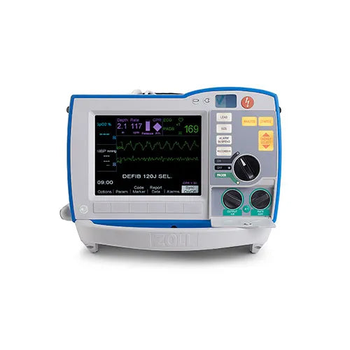 A medical defibrillator and monitor device with a blue and gray casing, featuring a color screen displaying vital signs and control buttons on the right side, set against a plain white background.