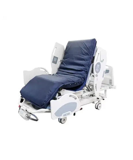An adjustable hospital bed with a navy blue padded mattress and white metal frame, shown on a plain white background.
