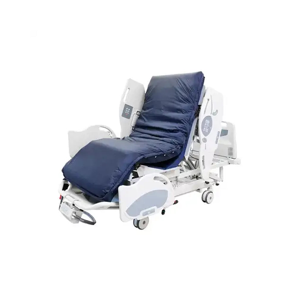 An adjustable hospital bed with a navy blue padded mattress and white metal frame, shown on a plain white background.