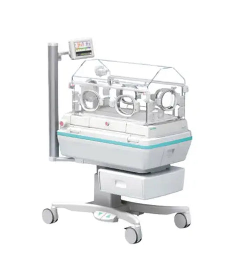 A medical incubator machine with a clear protective cover, four wheels, a side support pole with an attached display screen, and a white and light blue base, shown on a plain white background.