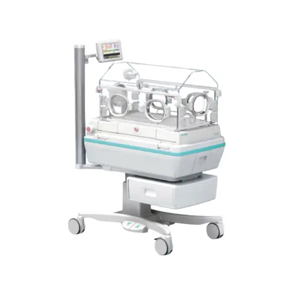A medical incubator machine with a clear protective cover, four wheels, a side support pole with an attached display screen, and a white and light blue base, shown on a plain white background.