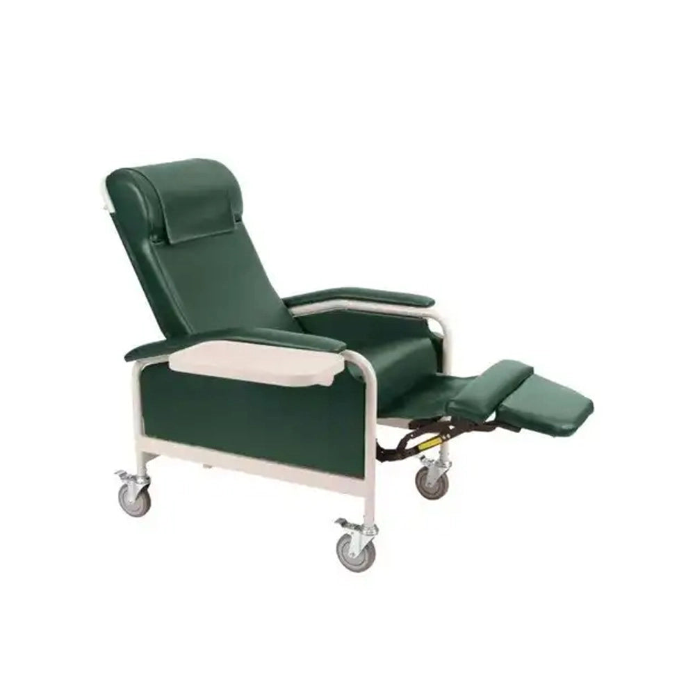A dark green adjustable medical recliner chair with a white metal frame and casters, featuring an extended footrest and a built-in white tray table.