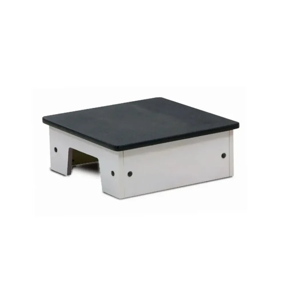 A small platform riser or step stool with a black top surface and a white metal frame, shown on a plain white background.