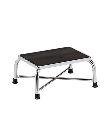 A small step stool with a black rectangular seat and a chrome metal frame with black rubber feet, shown on a plain white background.