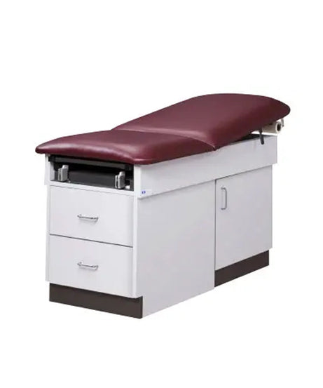 A medical examination table with a burgundy maroon padded top and a white storage cabinet base with two drawers and one cabinet door, shown on a plain white background.