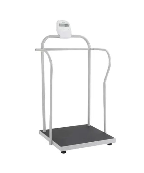 A digital standing scale with a black platform, white frame, and a small digital display on top, isolated on a white background.