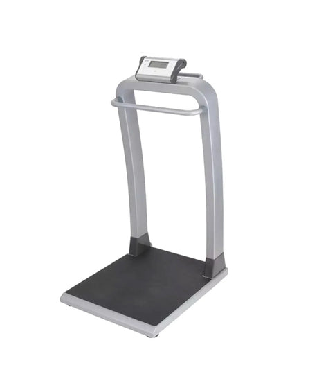 A digital step platform scale with a silver metal frame, black platform, and a small digital display on top, shown against a plain white background.