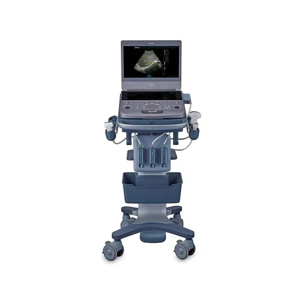 A medical ultrasound machine on a wheeled cart stand, shown from the front against a plain white background. The machine is dark gray with blue-gray accents and has an ultrasound image displayed on the screen.