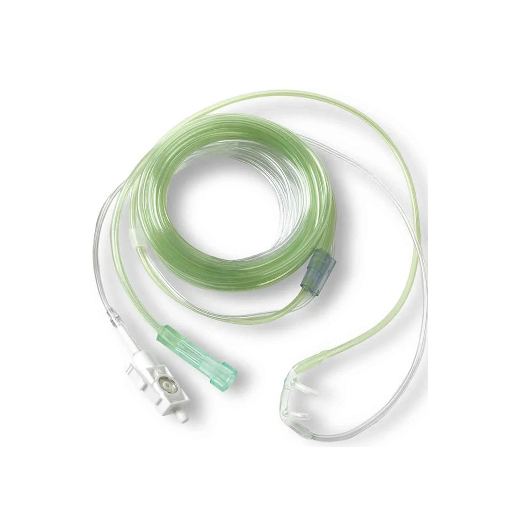 A medical nasal cannula tube set with a coiled translucent light green tube, a clear plastic connector, and a white and green nasal clip, shown on a plain white background.
