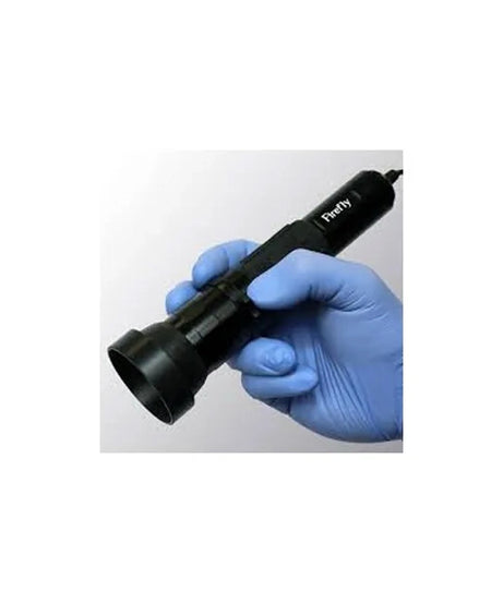 A black handheld device with a cylindrical head and a cord, shown being held by a hand wearing a blue nitrile glove. The device has the brand name 'PryDy' printed on it, set against a plain light gray background.