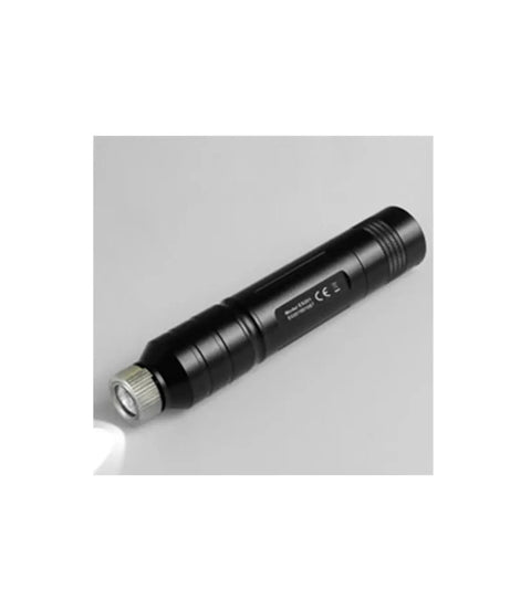 A black cylindrical flashlight with a silver textured bezel, shown diagonally on a light gray background.