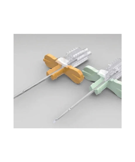 Two medical needle assemblies with clear plastic barrels, one featuring a yellow cross-shaped handle and the other with a mint green cross-shaped handle, shown on a light gray background.